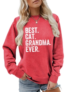 Detail of red crewneck sweatshirt featuring white Best Cat Grandma Ever print and ribbing