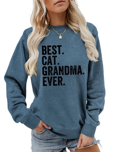 Detail of Best Cat Grandma Ever print on blue crewneck sweatshirt with ribbed cuffs