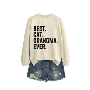 Beige Best Cat Grandma Ever sweatshirt paired with blue distressed denim shorts set