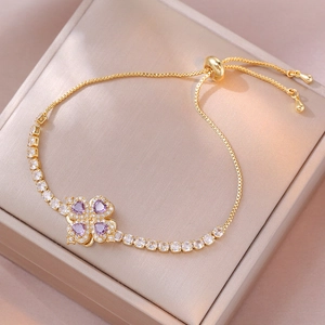 Bracciale a quadrifoglio dorato regolabile con pietre in zirconia viola a cuore