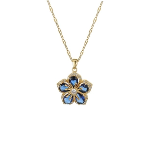 Élégant collier doré avec pendentif fleur en zircon bleu et pierre centrale claire