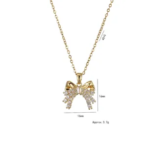 Golden bow pendant necklace with zircons, dimensions 16x16mm, length 40+5cm