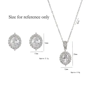 Sparkling silver halo jewelry set with oval cubic zirconia earrings and pendant necklace