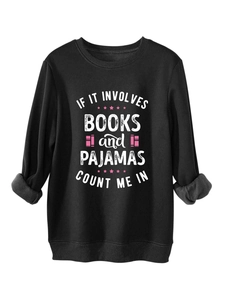 Détail de la doublure polaire et du slogan sur un sweat noir pour amateurs de livres