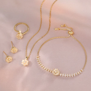 Collana Orecchini Bracciale Anello Fiore Rotante Acciaio Al Titanio Pietra Occhio Di Gatto Zircone Margherita Gioielli Eleganti Per Donne