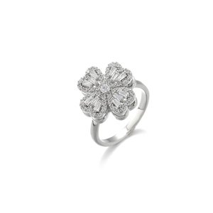 Macro view of silver four-leaf clover ring with pave-set sparkling zircon stones