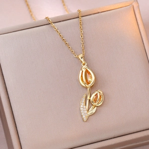Elegant gold tulip pendant necklace with orange crystals and white zircon stones