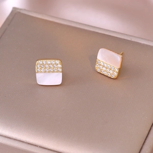Square gold earrings featuring micro-set cubic zirconia and natural white shell inlay