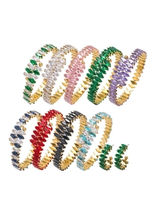Collection of gold-plated bracelets featuring colorful marquise-cut zircon stones