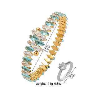 Women's gold bangle with marquise zircon stones and silver ring jewelry set