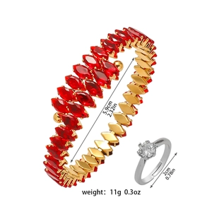 Detailed specs of gold bangle with red marquise zircon and silver ring set