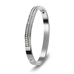 Close-up of silver-tone stainless steel bracelet with double row of square-cut cubic zirconia