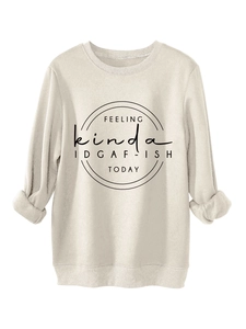 Detail of cream sweatshirt featuring 'FEELING kinda IDGAF-ISH TODAY' slogan with ribbed cuffs