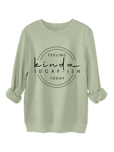 Detail of sage green sweatshirt featuring FEELING kinda IDGAF-ISH TODAY black text print
