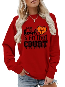Detail of red crewneck sweatshirt featuring My Heart Is On That Court basketball print