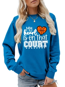 Detail of royal blue crewneck sweatshirt with My heart is on that COURT basketball print
