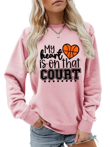 Detailed close-up of My Heart Is On That Court print on a pink crewneck sweatshirt