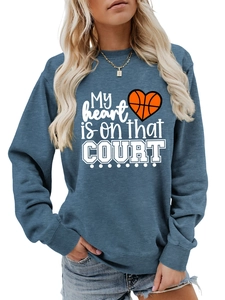 Detail of blue-grey basketball hoodie with My Heart is on that Court graphic print