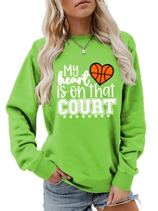 Detail of neon green crewneck sweatshirt with heart basketball print and court slogan