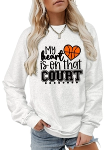 Close-up of My heart is on that COURT print and ribbed cuffs on grey sports sweatshirt