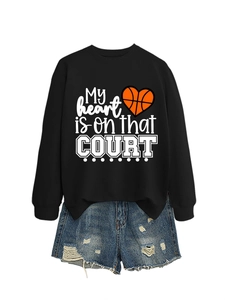 Black basketball sweatshirt and distressed denim shorts in a trendy flat lay style