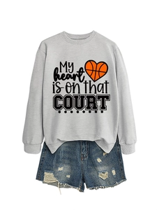 Detail of light grey sweatshirt featuring My heart is on that COURT basketball graphic