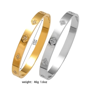 Gold and silver stainless steel clover bracelets with crystals and clasp closure