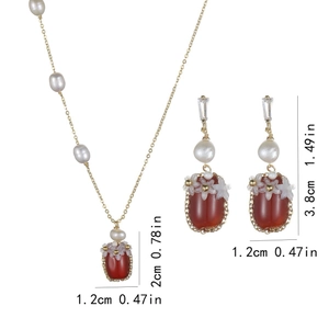 Parure vintage avec agate rouge, perles d'eau douce et fleurs pour collier et boucles