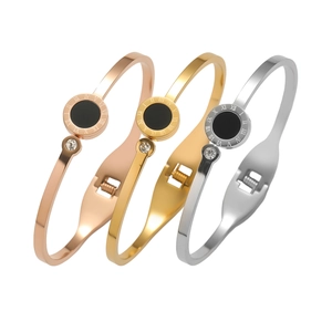 Three-color stainless steel bangles set with Roman numerals and crystal in rose gold