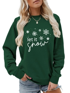 Detail of Let It Snow white script and snowflake print on dark green crewneck sweatshirt