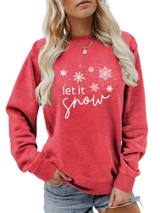 Close-up of Let It Snow text and snowflake print on red Christmas sweatshirt fabric