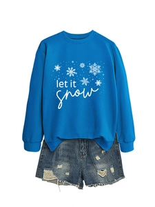 Detail of blue Let It Snow sweatshirt with snowflake print and distressed denim shorts