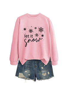 Pink sweatshirt featuring black let it snow print paired with distressed denim shorts