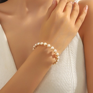 Bracelet de perles d'eau douce fait main avec fil d'or torsadé pour femmes élégantes