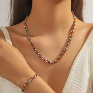 Kleurrijke emaille geometrische ketting en armband set met gouden titanium stalen afwerking