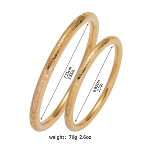 Polished gold titanium steel Fu character bracelets set with traditional relief pattern