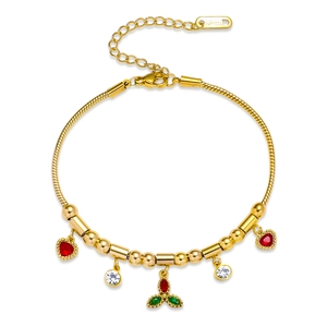 Close-up of gold stainless steel snake chain with red heart charms and zircon beads