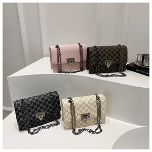 Multiple luxury crossbody chain bags in pink, brown, black and cream with M pattern