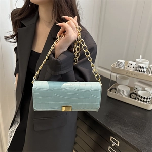 Elegant light blue crocodile embossed square bag with gold chain strap for women
