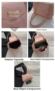 Interno della borsa rosa che mostra la capienza per laptop e cosmetici
