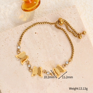 Adjustable golden butterfly chain bracelet with sparkling cubic zirconia accents