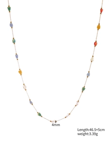 Detail of colorful faceted triangle beads and necklace dimensions shown on white backdrop