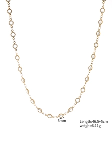 Detailed view of long gold bezel-set glass stone necklace with dimensions and weight