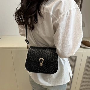 Elegant black woven textured shoulder bag with gold horseshoe buckle for women