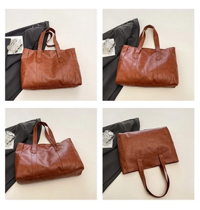 Viste multiple della grande borsa tote in ecopelle marrone con dettagli dei manici