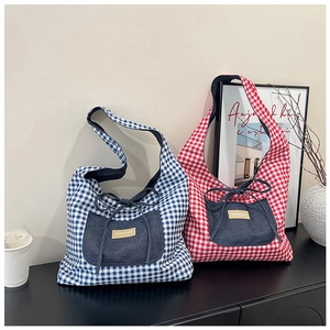 Stylish red and blue checkered tote bags featuring denim pockets and bow details