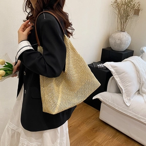 French style straw woven shoulder bag with brown leather straps for beach holidays