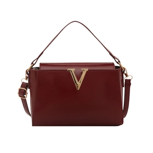 Burgundy faux leather crossbody handbag with gold V-shaped logo and top handle