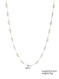 Detail showing 6mm heart pendant and 45.5+5cm golden chain measurements on white background