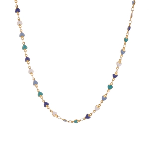 Close-up of heart enamel necklace with multi-colored blue and white charms on gold chain